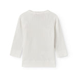 Fleece pointelle blouse for newborns with a wrap-around closure.