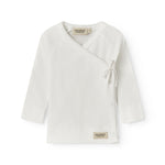 Fleece pointelle blouse for newborns with a wrap-around closure.