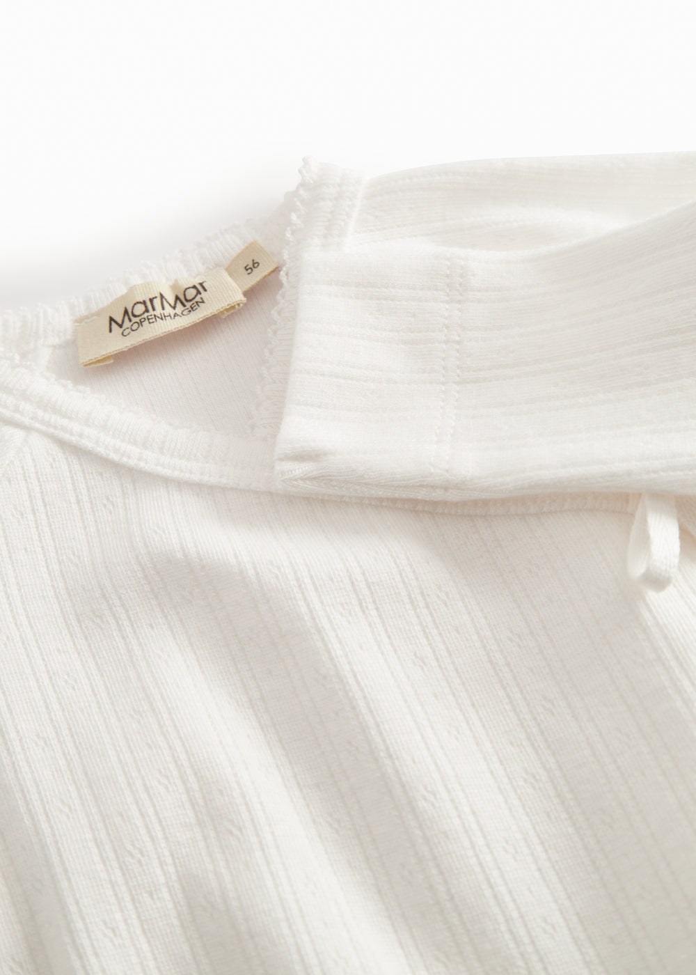 White pointelle dress with feet for newborns