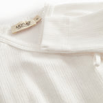 White pointelle dress with feet for newborns