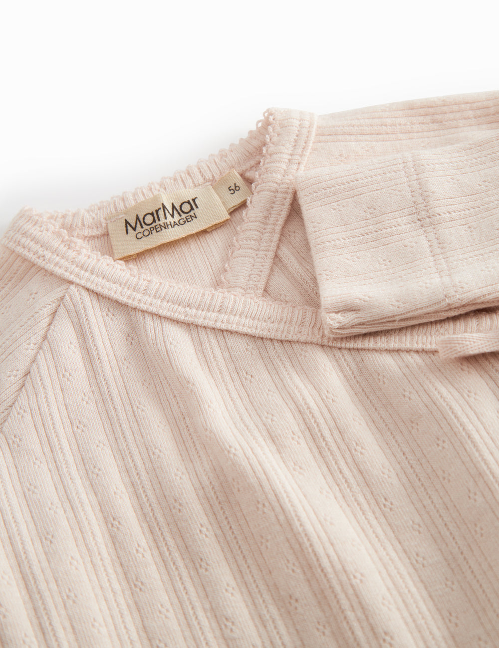Langærmet Lyserød pointelle heldragt med fødder til nyfødte

Translation:
Long-sleeved pink cotton onesie with feet for newborns