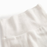 White crewneck pants with feet for a newborn baby