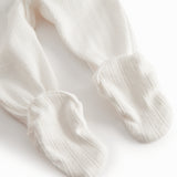 White crewneck pants with feet for a newborn baby