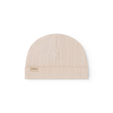 The baby hat in red with a contrasting edge.