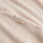 Red polka dot baby blanket with rounded corners and picot edges.