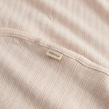 Red polka dot baby blanket with rounded corners and picot edges.