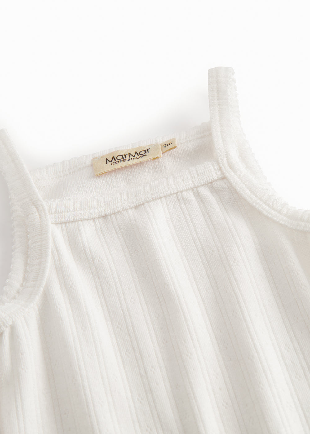 Baby bodystocking without sleeves with garters