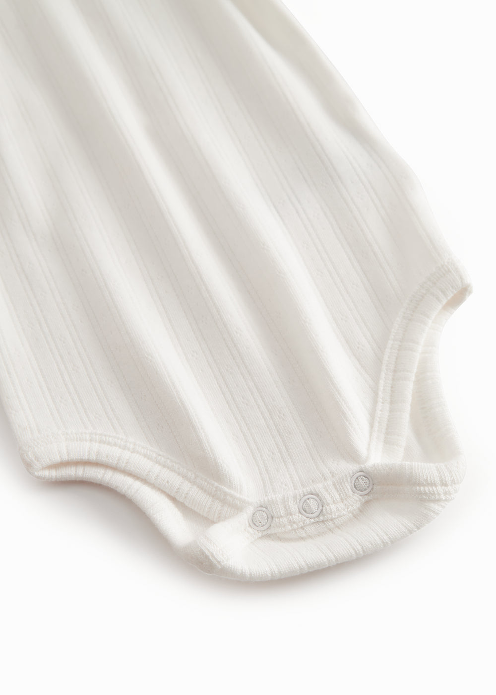 Baby bodystocking without sleeves with garters