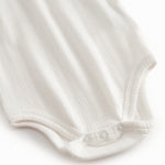 Baby bodystocking without sleeves with garters