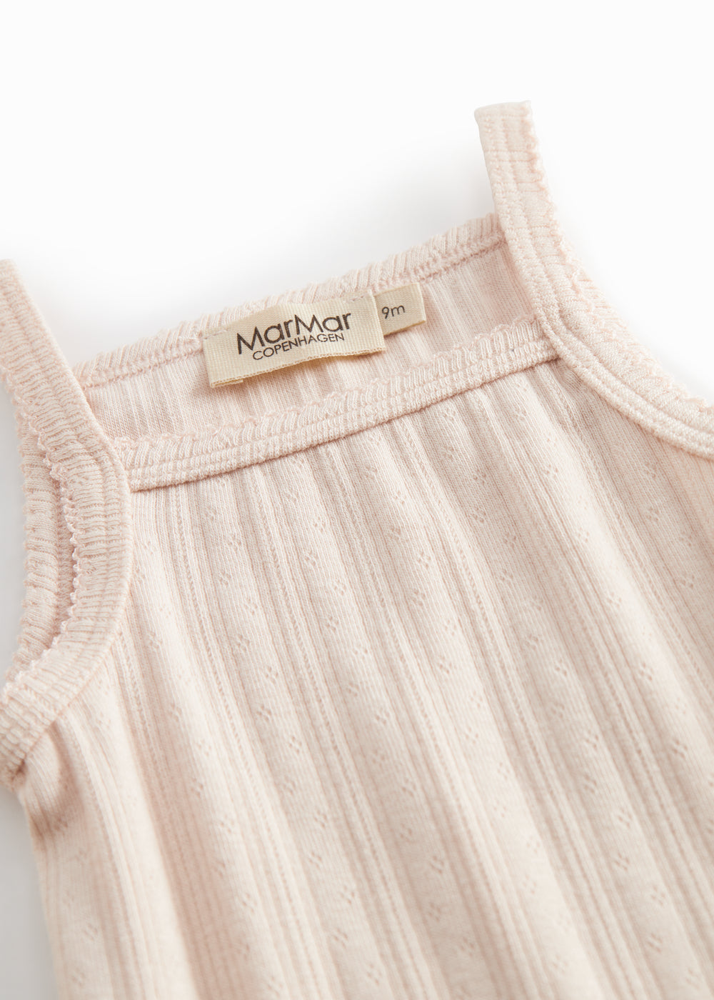 Red baby bodystocking without sleeves with garters