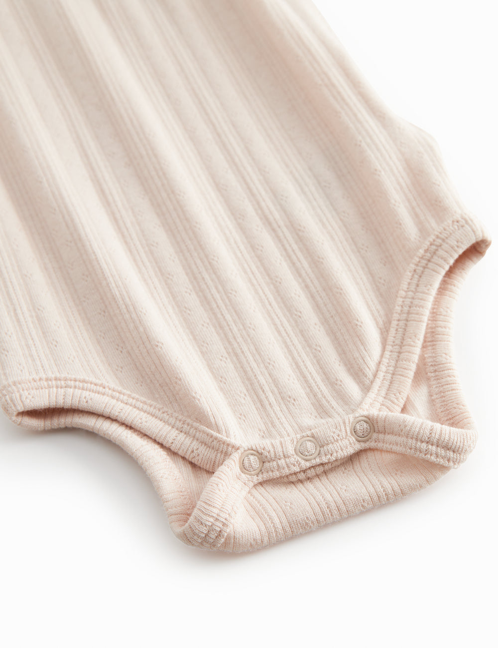 Red baby bodystocking without sleeves with garters