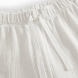 White pinstripe baby pants with elastic and a decorative band at the waist.
