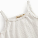White t-shirt for children with pique details and thin straps.