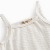 White t-shirt for children with pique details and thin straps.