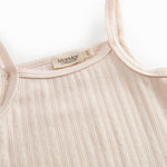 Red undershirt for children with embroidered details and thin straps.