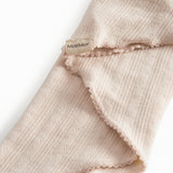 Strikket babyhalstørklæde i lyserød