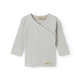 Light green pointelle blouse for newborns with a wrap-around closure.