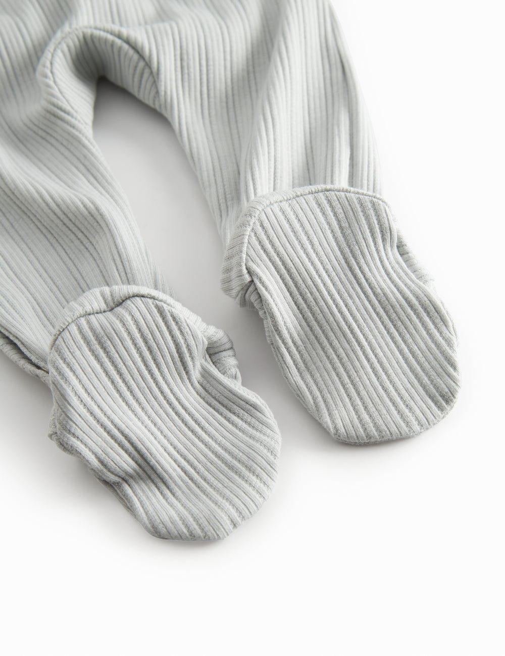 Light green pointelle fabric with feet for newborns