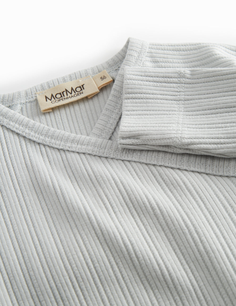 Lime green long-sleeved pointelle held with a and button for