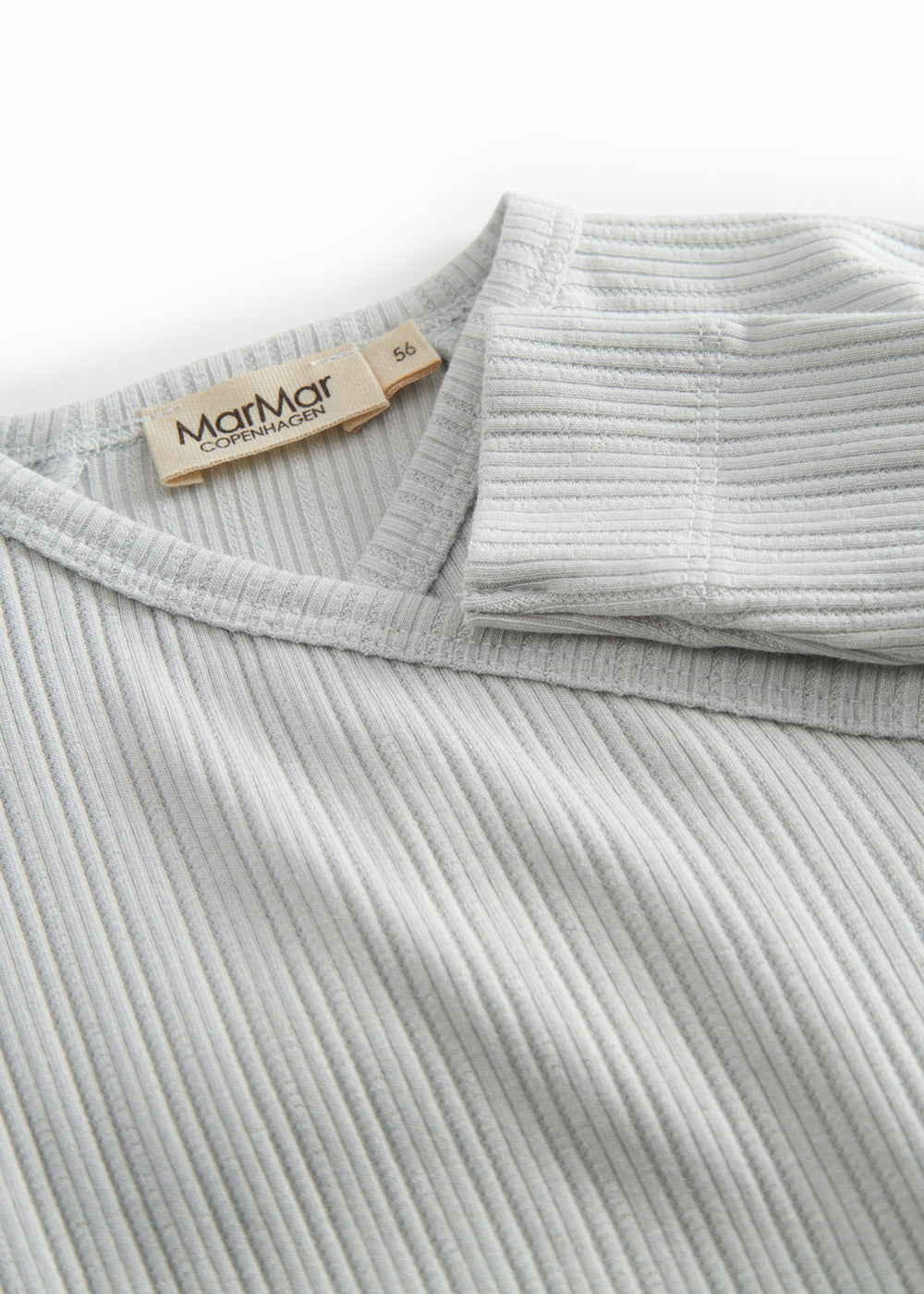 Lime green long-sleeved pointelle held with a and button for