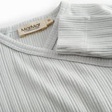 Lime green long-sleeved pointelle held with a and button for