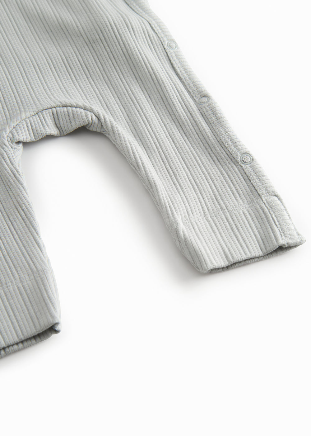 Lime green long-sleeved pointelle held with a and button for