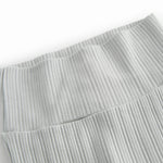 Green pointelle pants with feet for a newborn baby