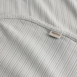 Lime green pointelle baby blanket with rounded corners and picot edges