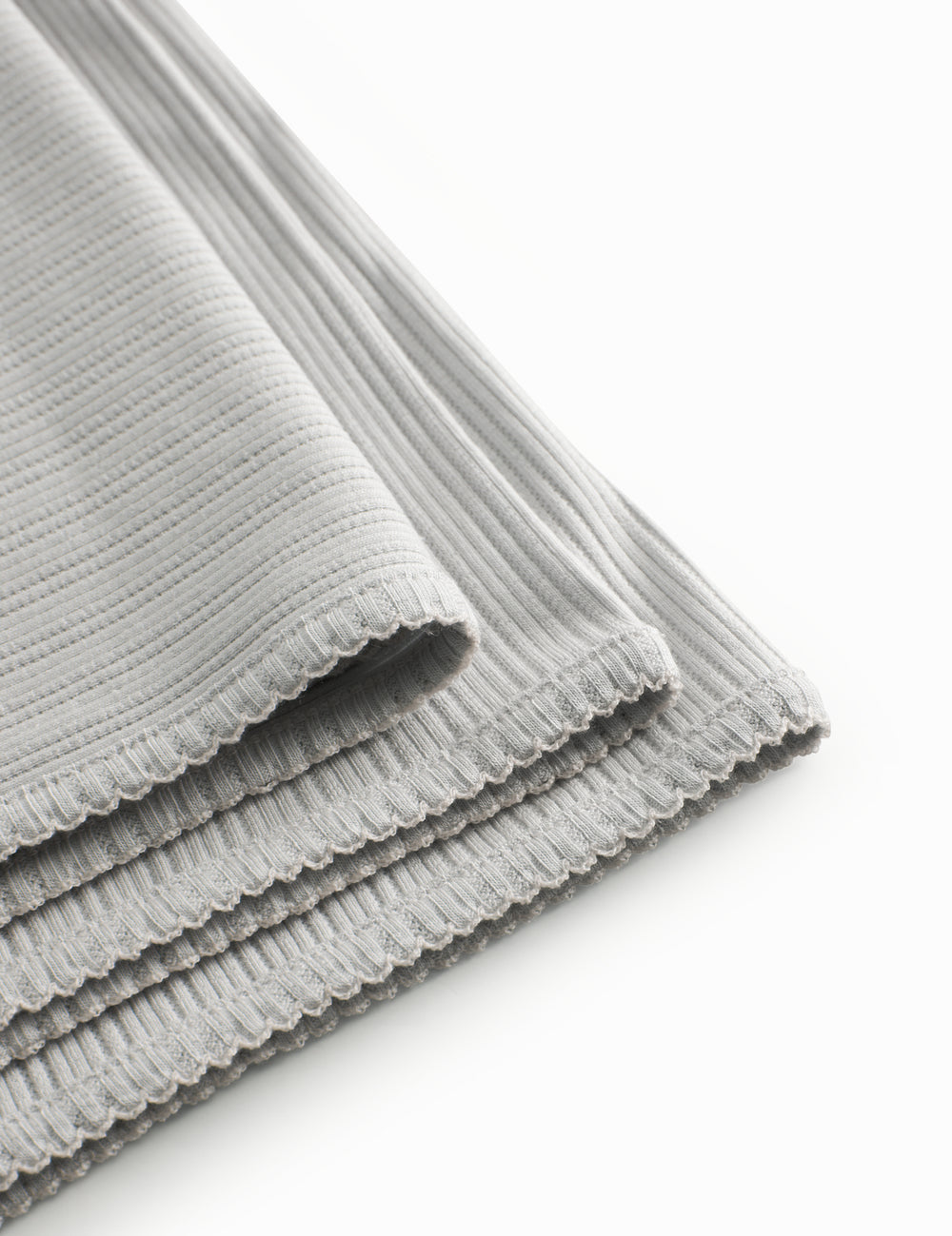 Lime green pointelle baby blanket with rounded corners and picot edges