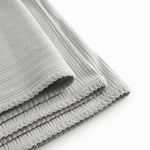 Lime green pointelle baby blanket with rounded corners and picot edges