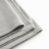 Lime green pointelle baby blanket with rounded corners and picot edges