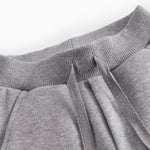 Gray sweatpants for baby with drawstrings and rosa MarMar logo.