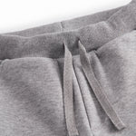 Grå sweat bukser til børn med rosa MarMar logo på lommen og bindebånd