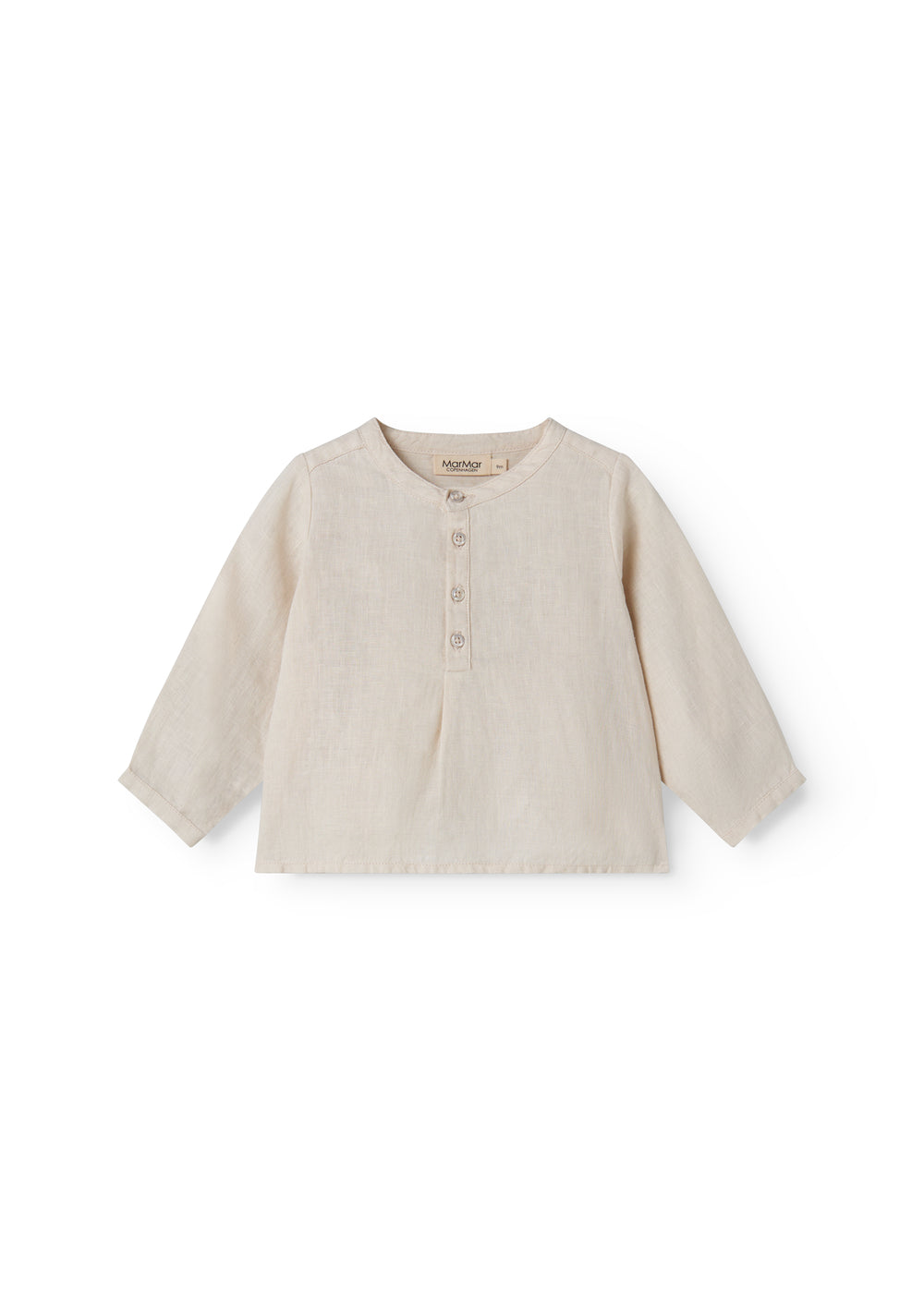 Sleeveless beige top for baby with ruffle details.