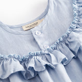 Light blue dress for a baby with short sleeves and ruffled details.