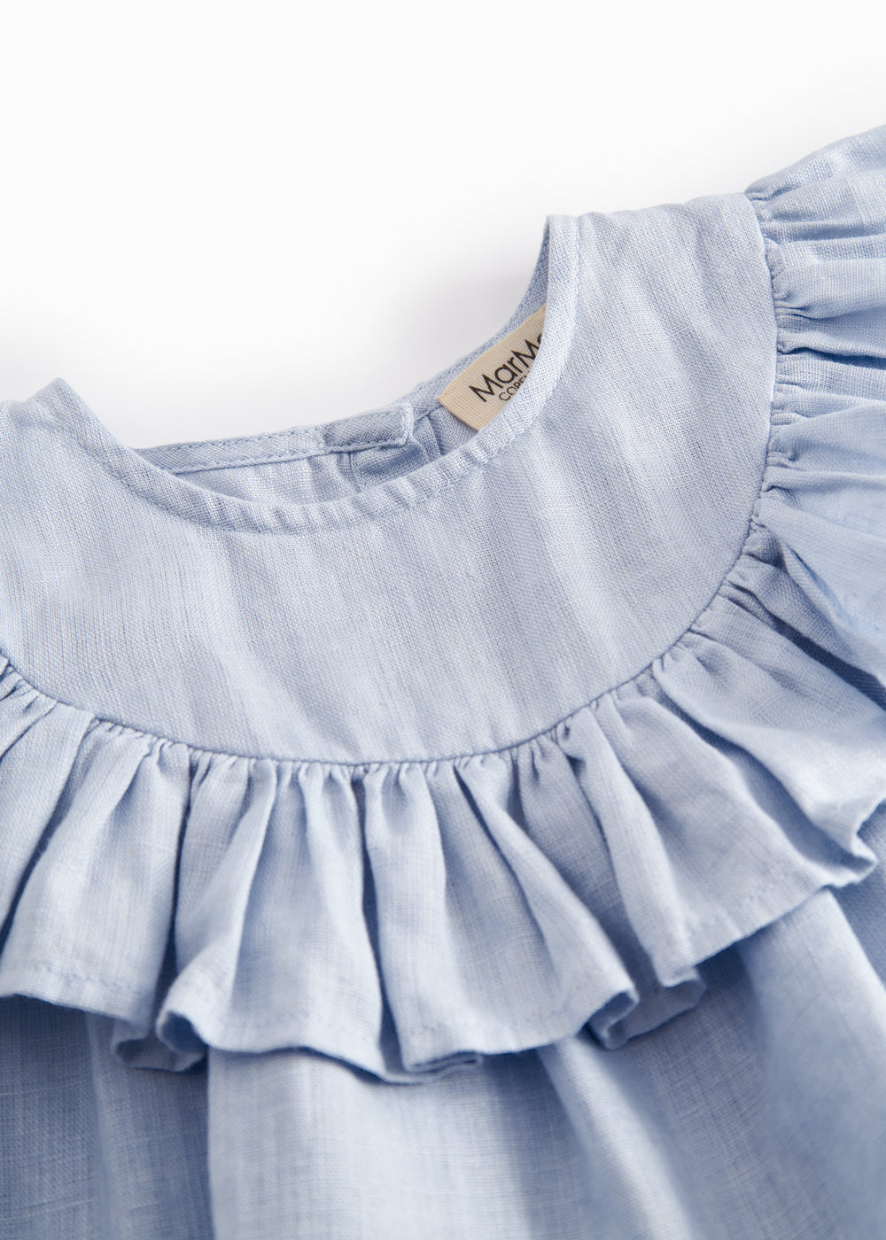 Ærmeløs top til baby med flæsedetaljer