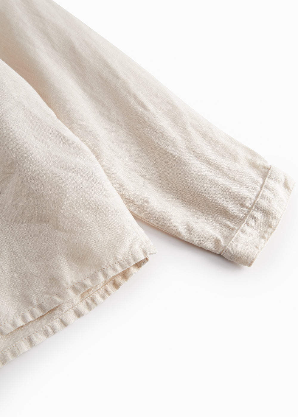 Beige long-sleeved shirt for children with a Mandarin collar and front button-up.