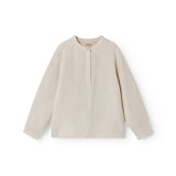 Beige long-sleeved shirt for children with a Mandarin collar and front button-up.