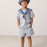 Boy wearing a matroshka and inspired by a set