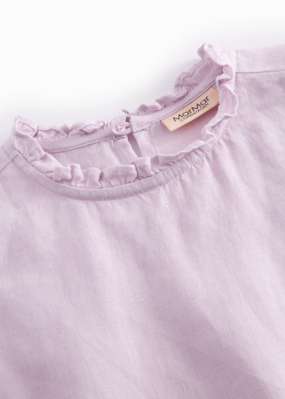 Ærmeløs lys lilla top til børn med flæsedetaljer