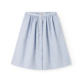 Light blue dress for children with side pockets and buttons.