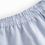 Lyseblå shorts til børn med flæser og sidelommer