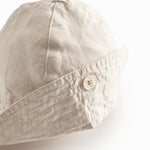 Beige sommerhat til baby