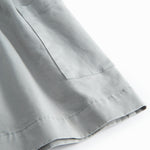 Sleeveless blue chino dress for children with buttons