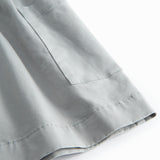 Sleeveless blue chino dress for children with buttons