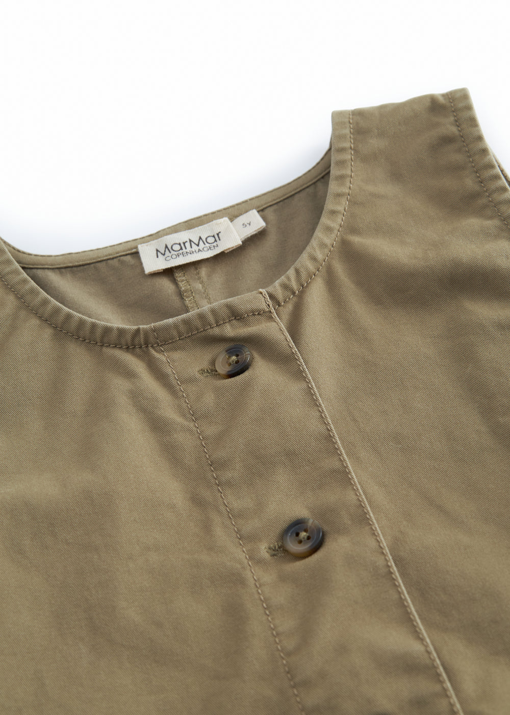 Sleeveless green chino dress for children with buttons.