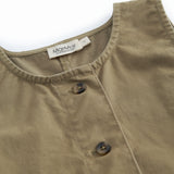 Sleeveless green chino dress for children with buttons.