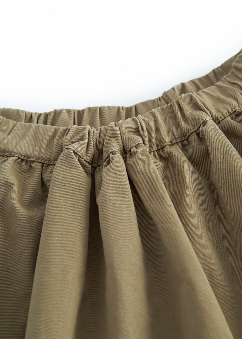 Green chino pants for children with a wide fit.