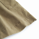 Green chino pants for children with a wide fit.