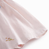 Short-sleeved baby dress with pretty floral embroidery, short sleeves, and collar.